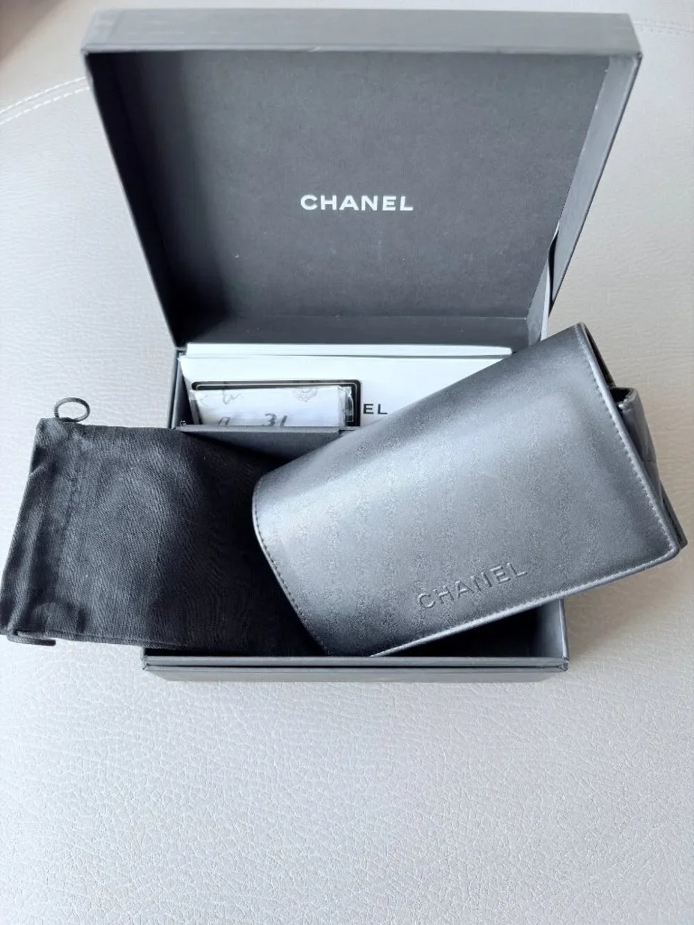 Chanel Butterfly Sunglasses featuring a removable pearl chain